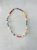 white, red, blue, yellow beads