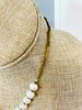 the necklace has a vintage chain on part of it