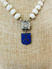 Dames De La Charite is the marking on the blue medal.