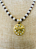 Bee pendant with 9 Swarovski crystal on top of the pendant