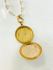 vintage gold filled locket with space for photos on inside