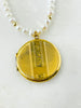 vintage gold locket with embossing on front