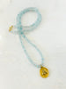 aquamarine and bee charm necklace