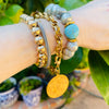 gold, silver and grey bracelets
